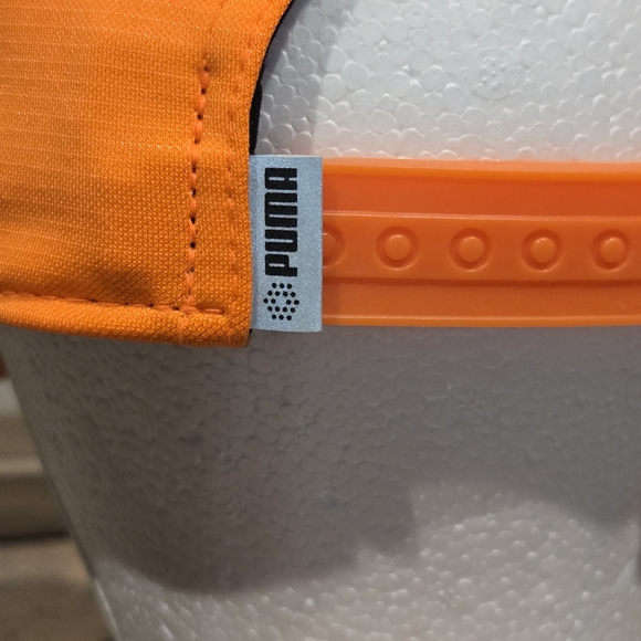 Puma P 110 Snapback Golf Hat in the color Vibrant Orange #022537-09 - Picture 6 of 10